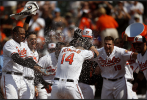 Nolan Reimold scores as his teammates wait for him at home.