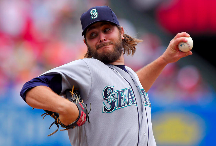 Wade Miley of the Mariners pitches.