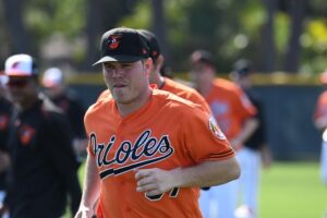 Dylan Bundy jogs in Spring Training.