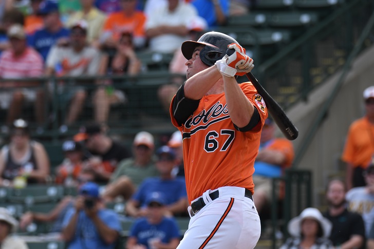 Trey Mancini swings for the Orioles.