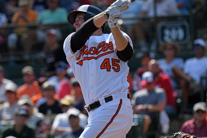 Mark Trumbo of the Orioles follows through on a swing.