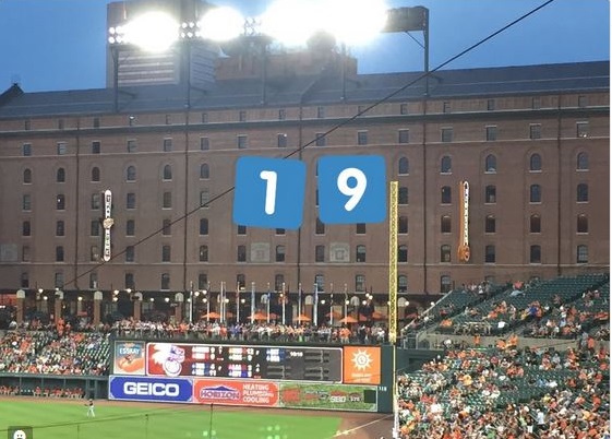 A fake 19 banner at Oriole Park at Camden Yards on the Warehouse.