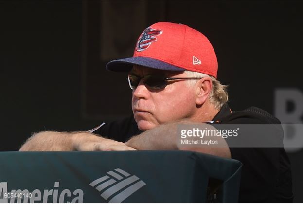 Buck Showalter looks out from the dugout.