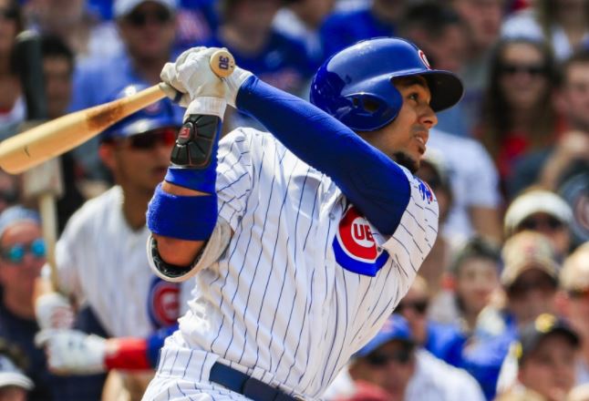 Cubs' Jon Jay finishes his swing.