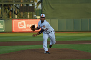 Nestor Cortes Jr. pitches from the mound.