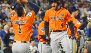 Carlos Correa and George Spinger celebrate.