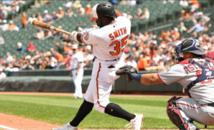 Dwight Smith Jr. hits against the Twins.