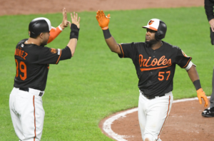 Hanser Alberto and Renato Nunez high five.